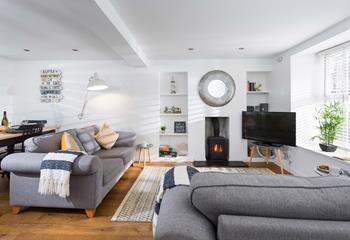 Sink into the plush sofas in front of the ambient crackle of the woodburner.