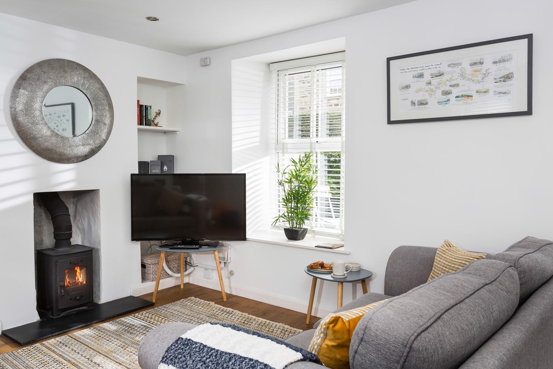 This cosy cottage is filled with stylish interiors whilst keeping its Cornish cottage charm.