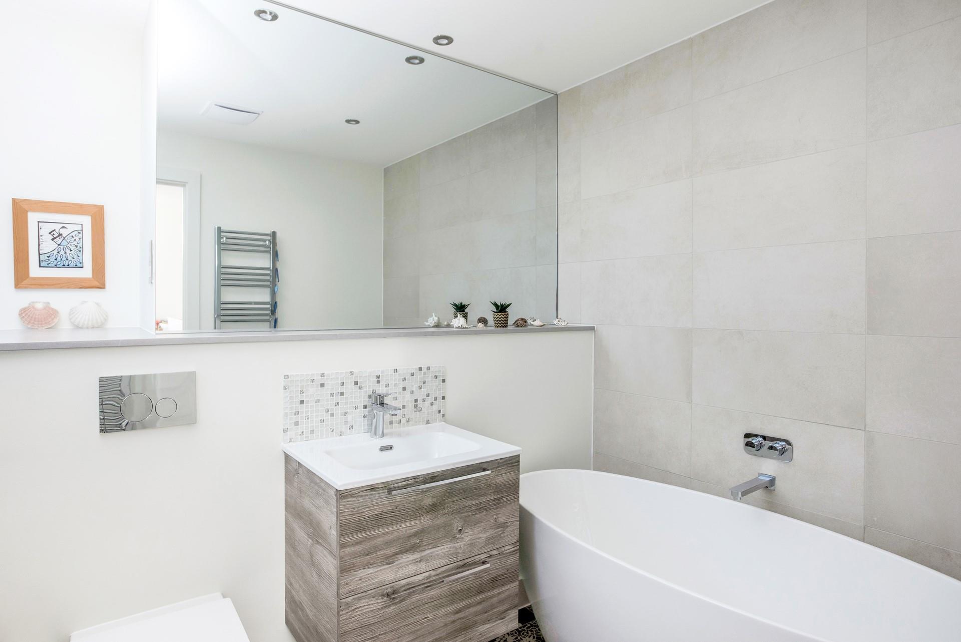 Run yourself a bath to unwind in the evening after a coast path ramble.