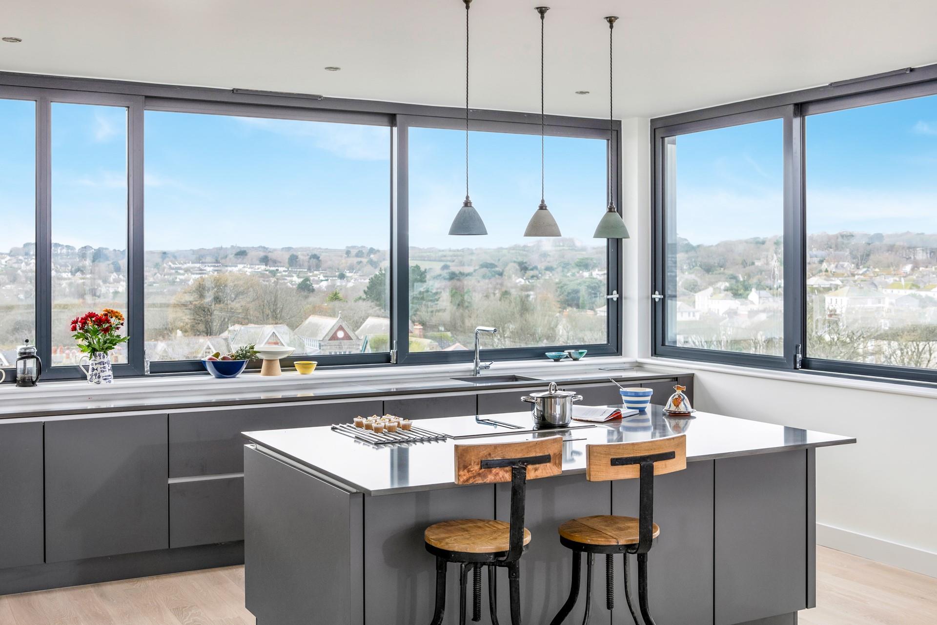 The kitchen is spacious and well-equipped for cooking delicious meals.