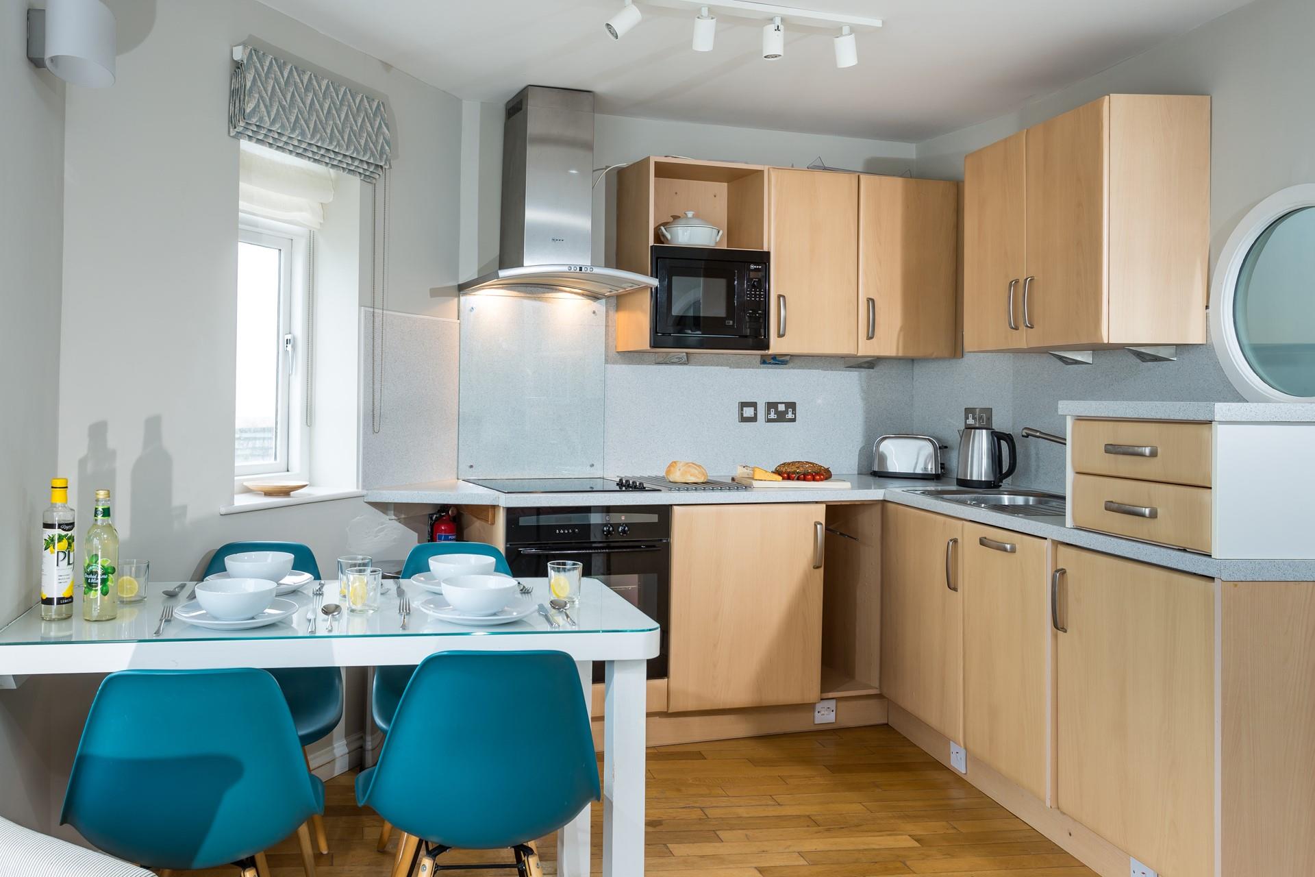 The kitchen is fully equipped to cook tasty meals.