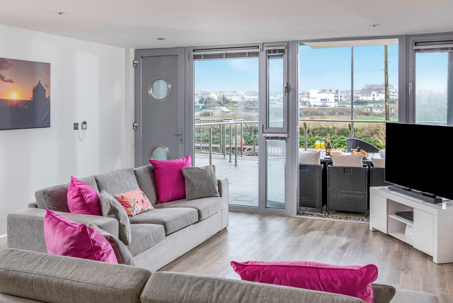 The sitting room has bright pops of colour and is the perfect spot to relax.