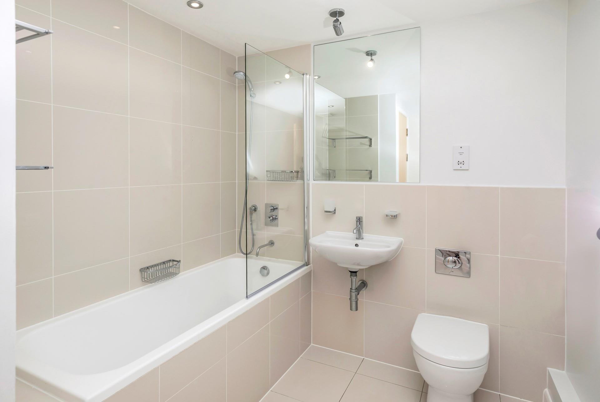 Relax with a soak in the bath after a coastal stroll.