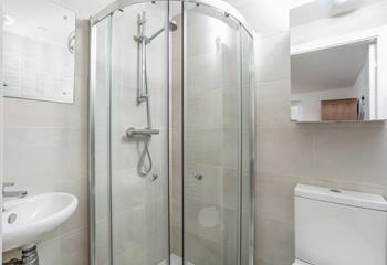 Get ready for the day in the en suite shower room.