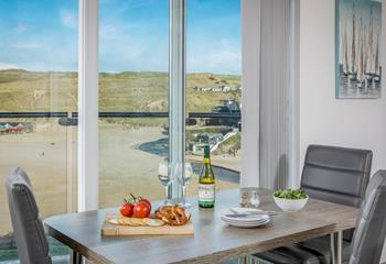 The dining table offers an enviable position with a stunning view.