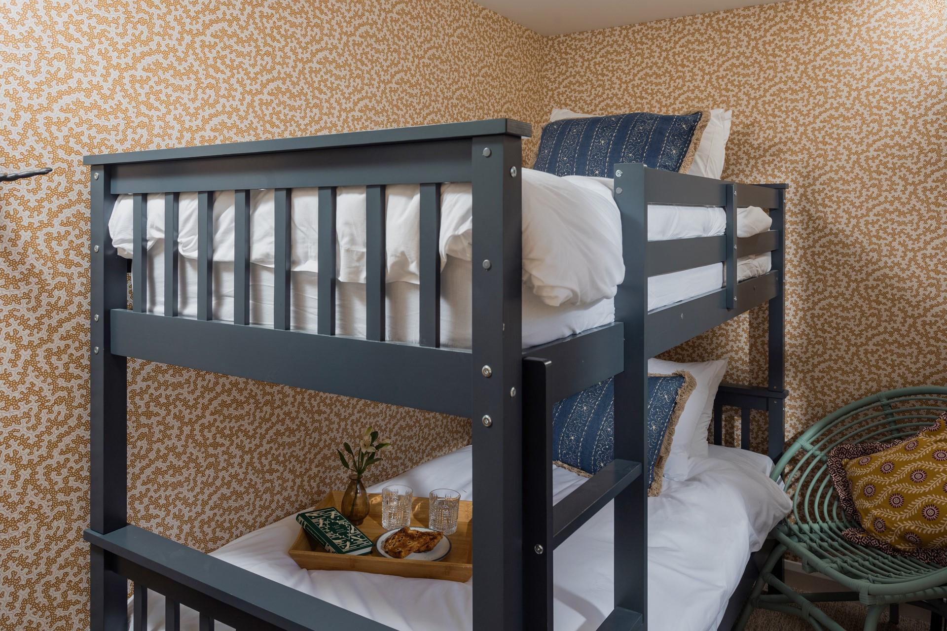 Kids will love the colourful bunk bedroom.