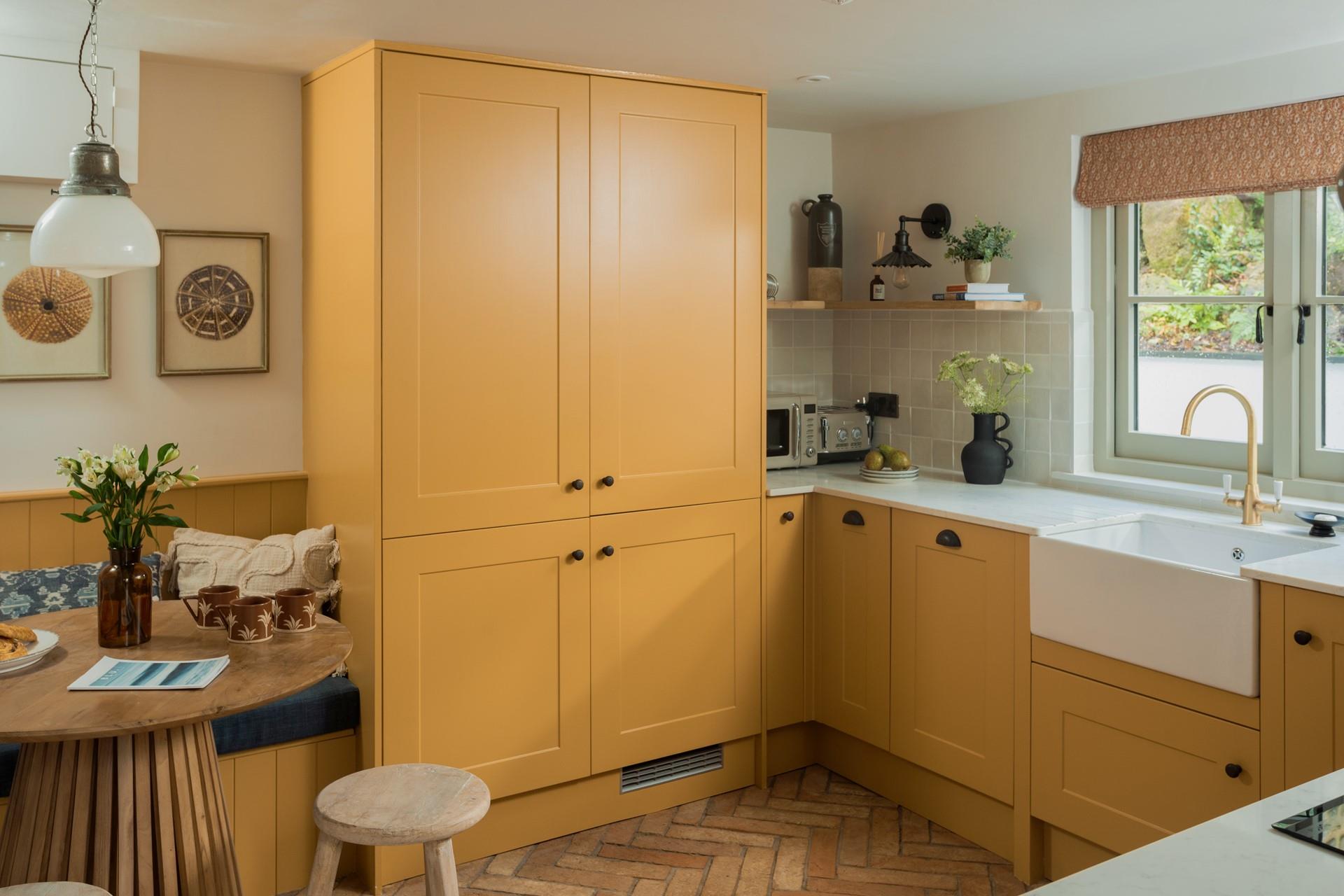 The kitchen is thoughtfully designed, with all the amenities you need for a relaxing stay.