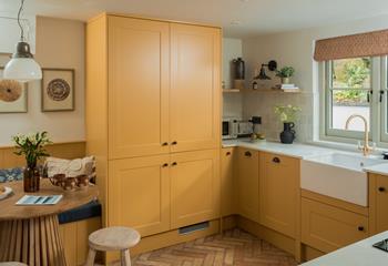 The kitchen is thoughtfully designed, with all the amenities you need for a relaxing stay.