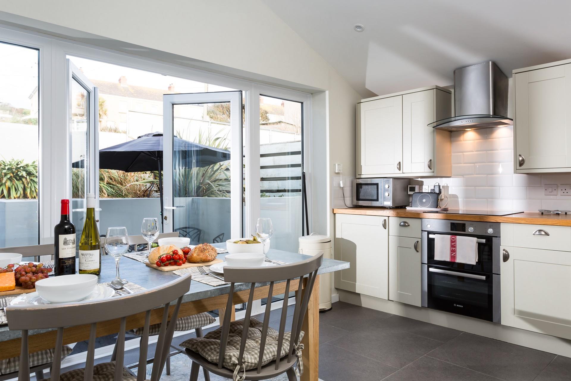 Sit around the dining table and tuck into a tasty home-cooked feast.