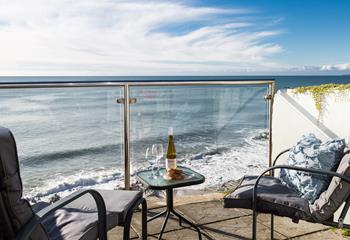 Take your favourite tipple out to the balcony and enjoy the stunning uninterrupted views.