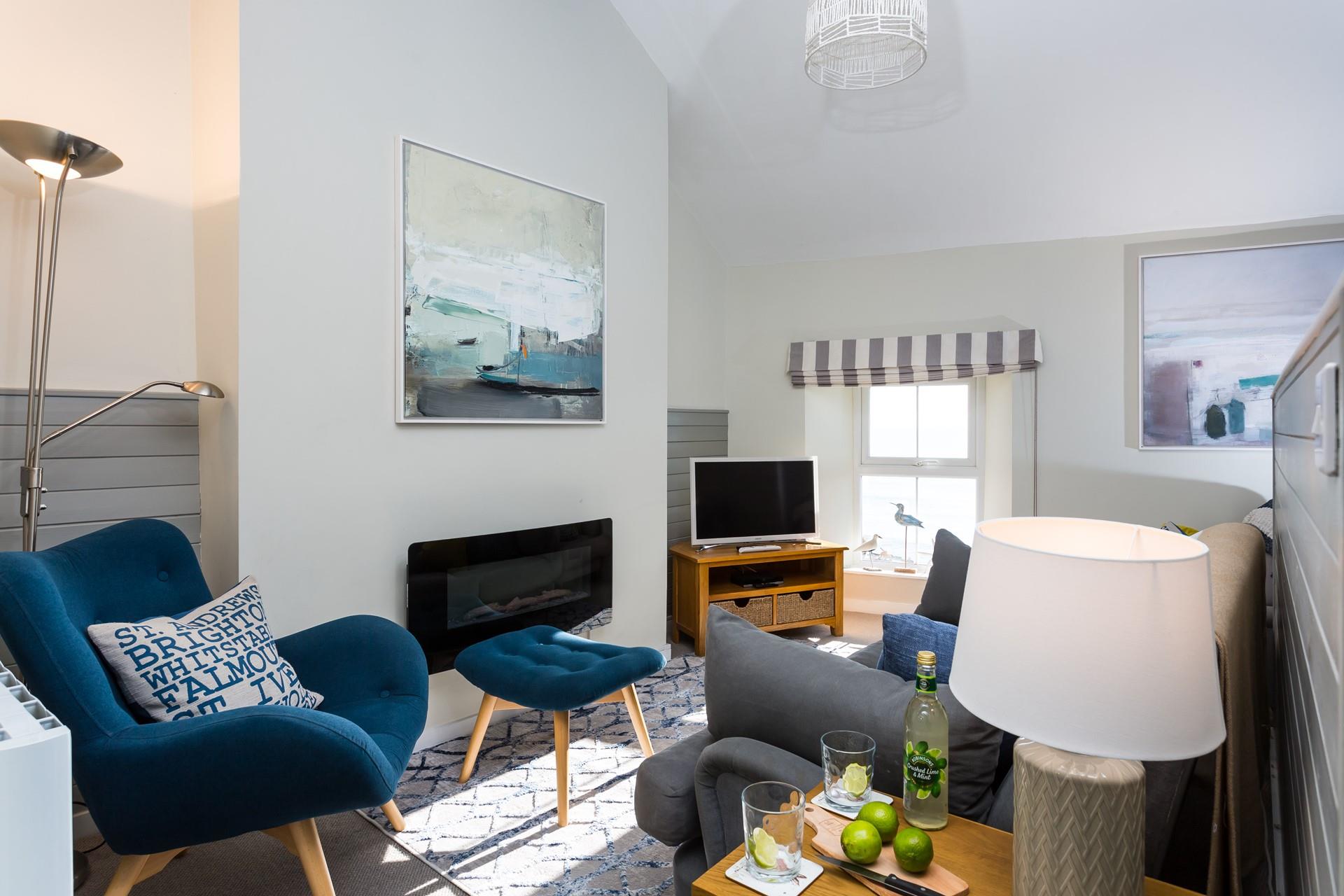 The cosy sitting room is the perfect base to come back to after a day's adventure.