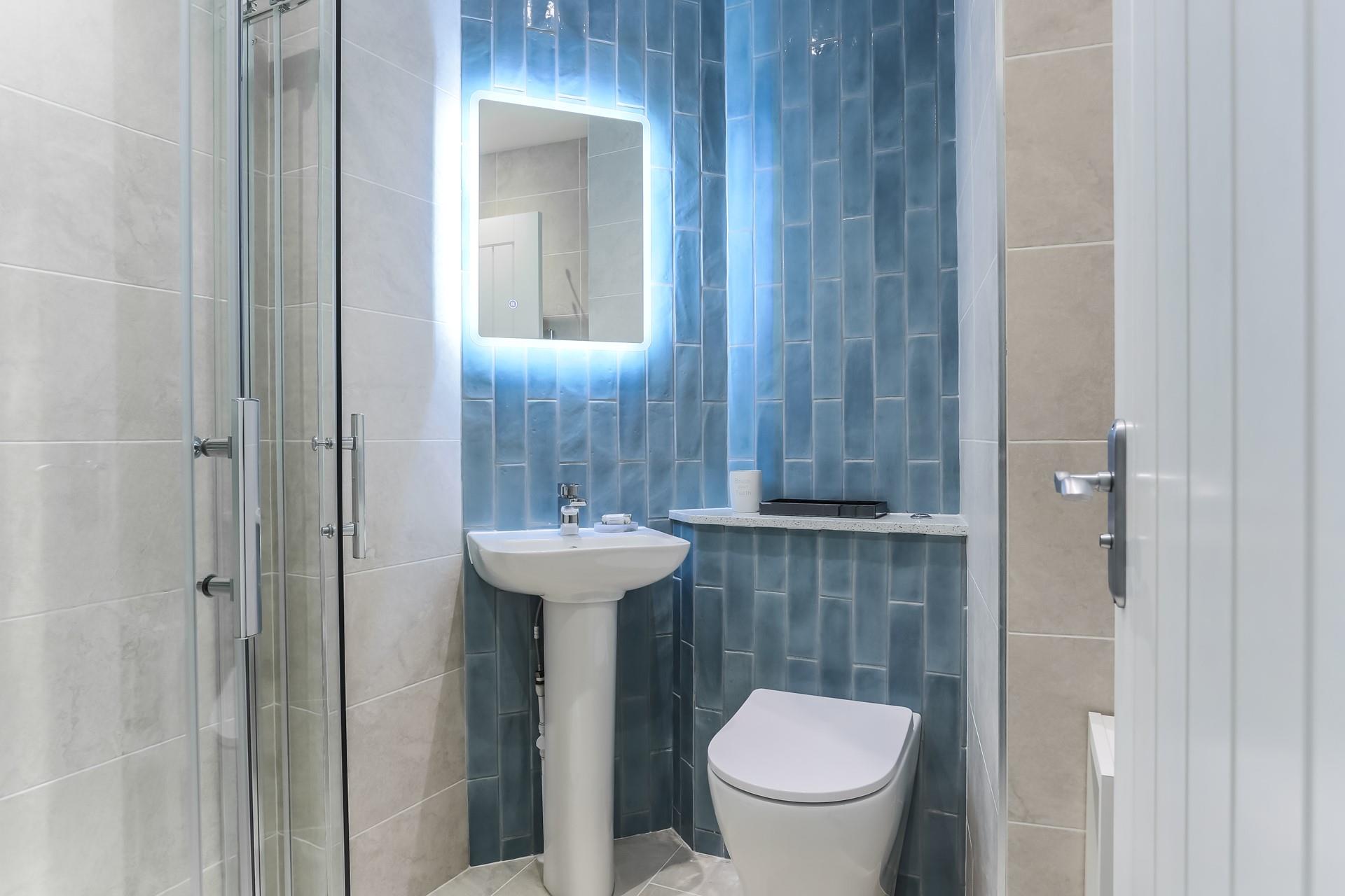 The shower room is modern and stylish to get ready in the morning.