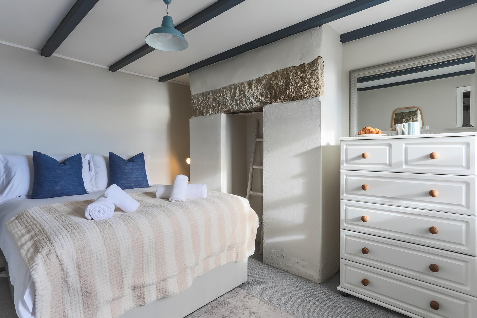 Climb into the double bed after a busy day of exploring the south coast.