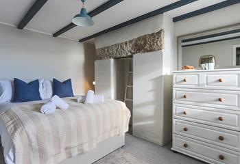Climb into the double bed after a busy day of exploring the south coast.