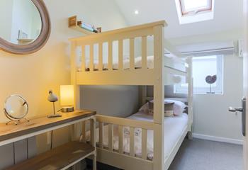 The bunk beds are perfect for the little ones to tuck into.