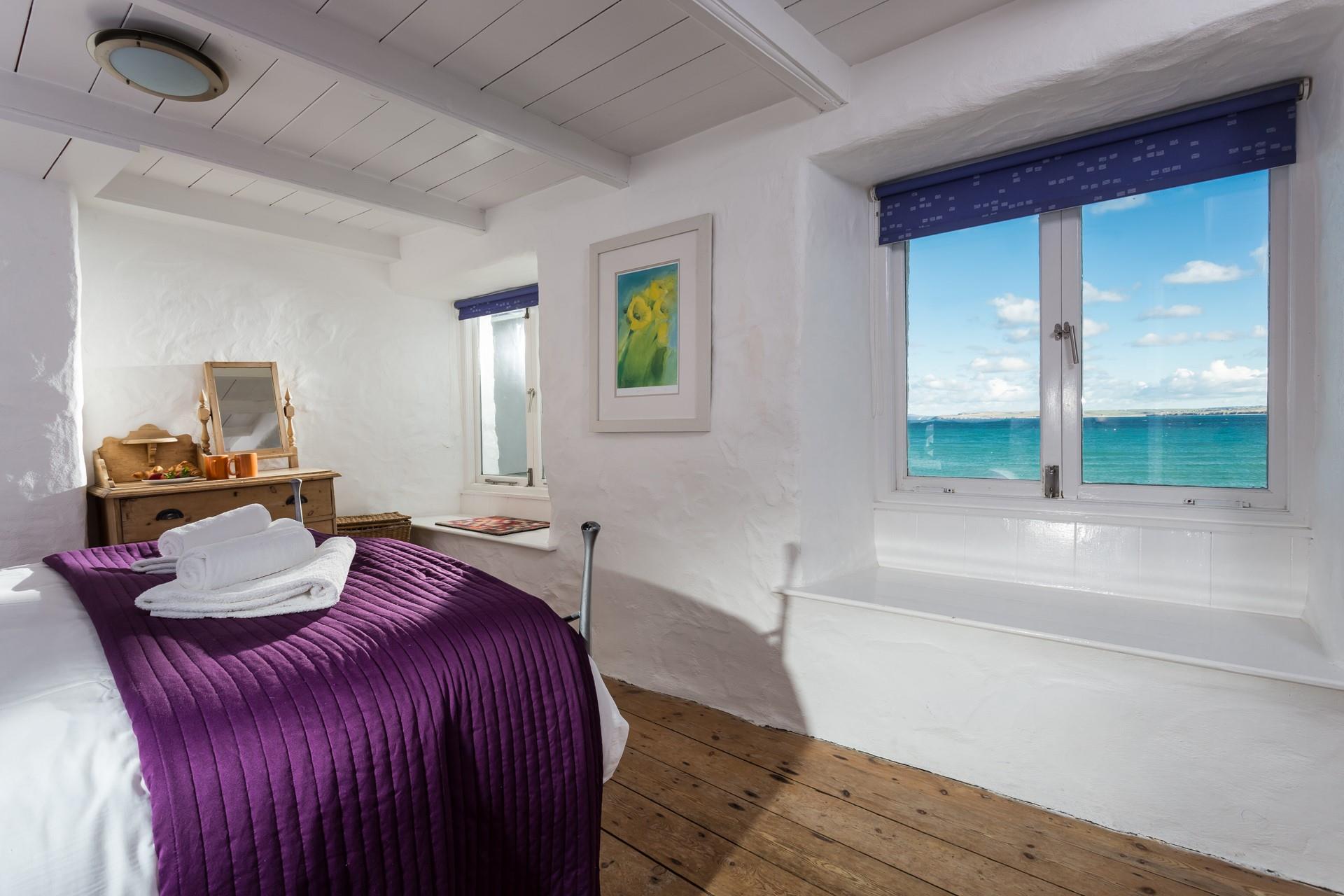 Wake up to stunning sea views from the master bedroom.