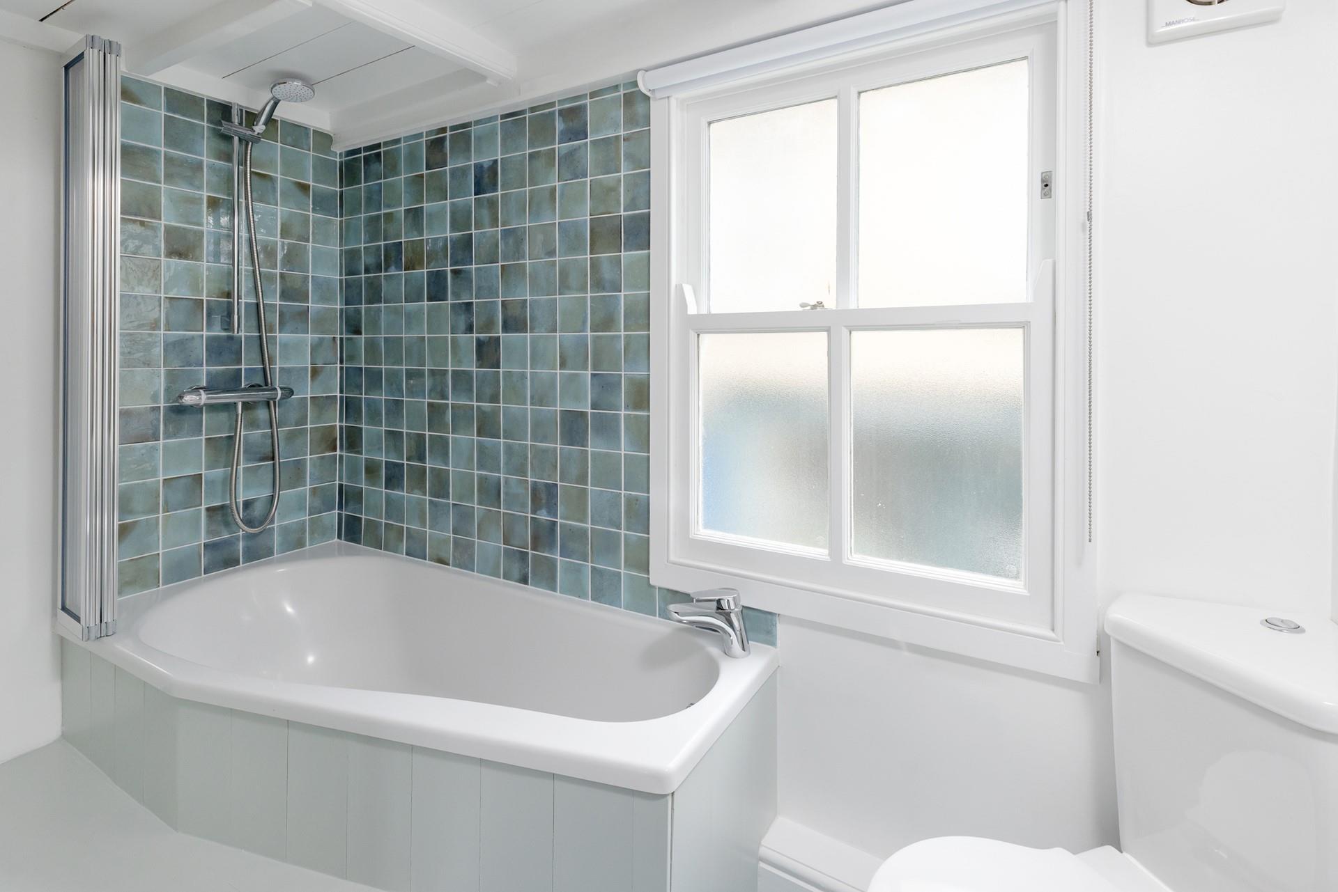 Run yourself a relaxing bath to unwind after a day of coastal exploring.