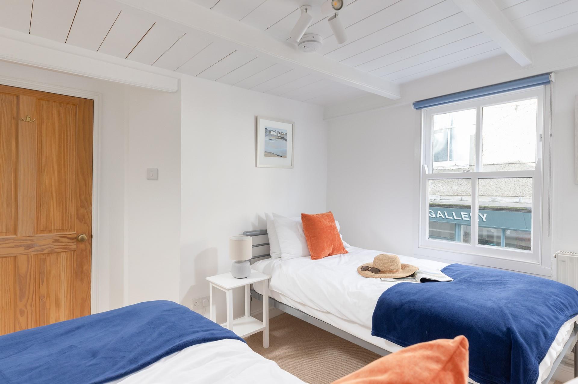 Bedroom 2 has twin beds perfect for adults or children.