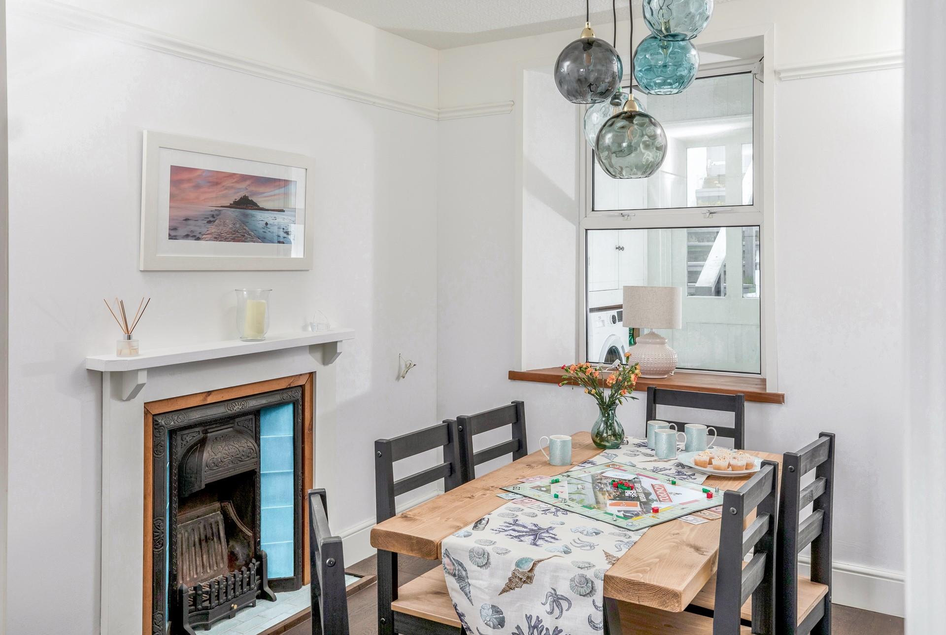 Sit around the dining table and tuck into tea and local cake.