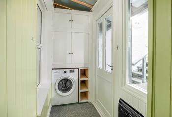 The utility room leads out to the garden area.