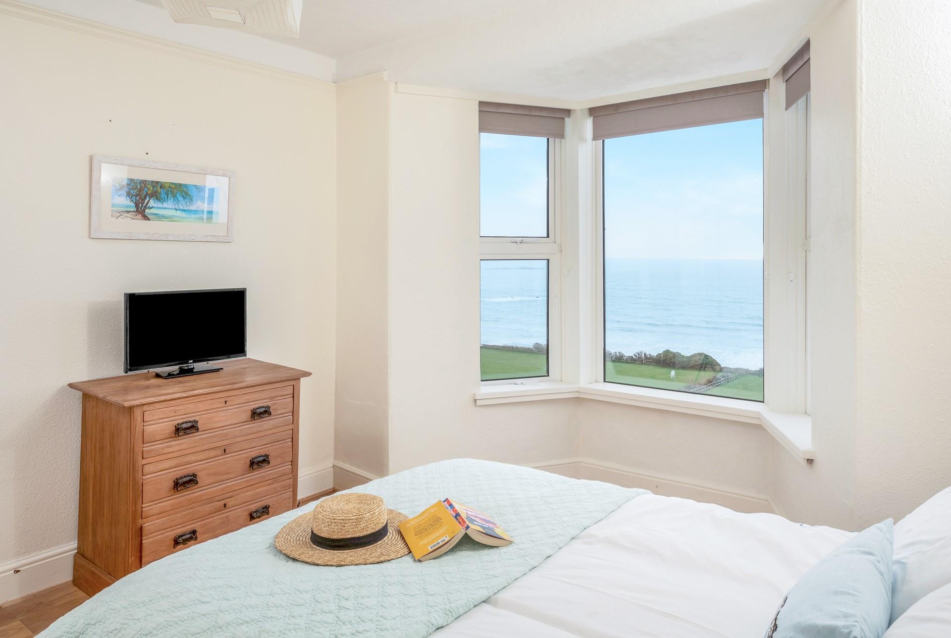 Watch the sunrise over the Bay each morning from the lovely bedroom.