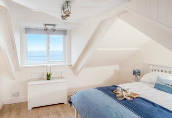 Bedroom 3 has a spacious king size bed and sea views.