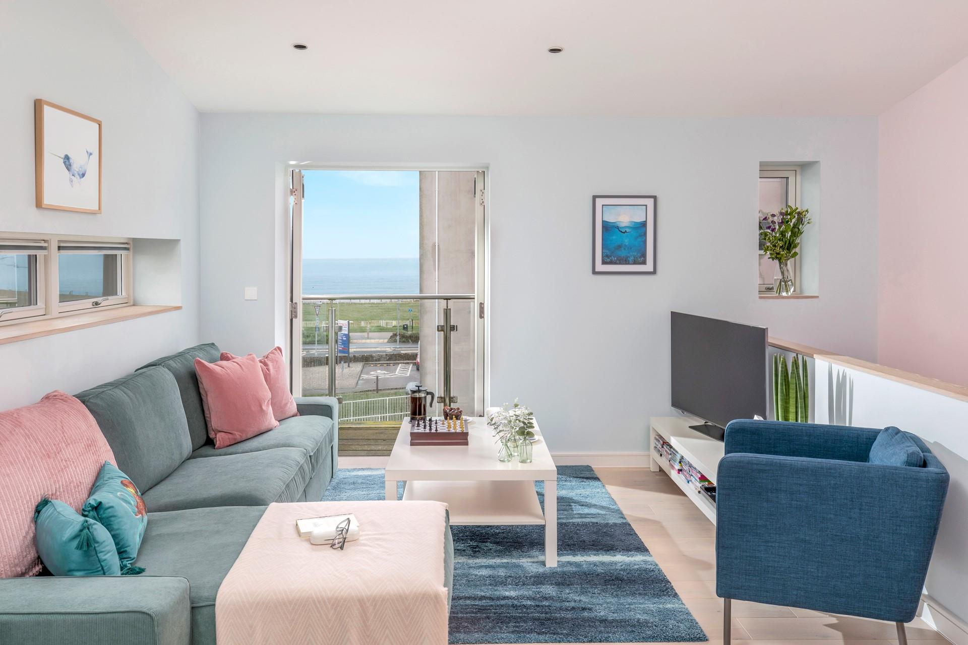 Sink into the sofa and enjoy a relaxing evening in the comfortable sitting room.