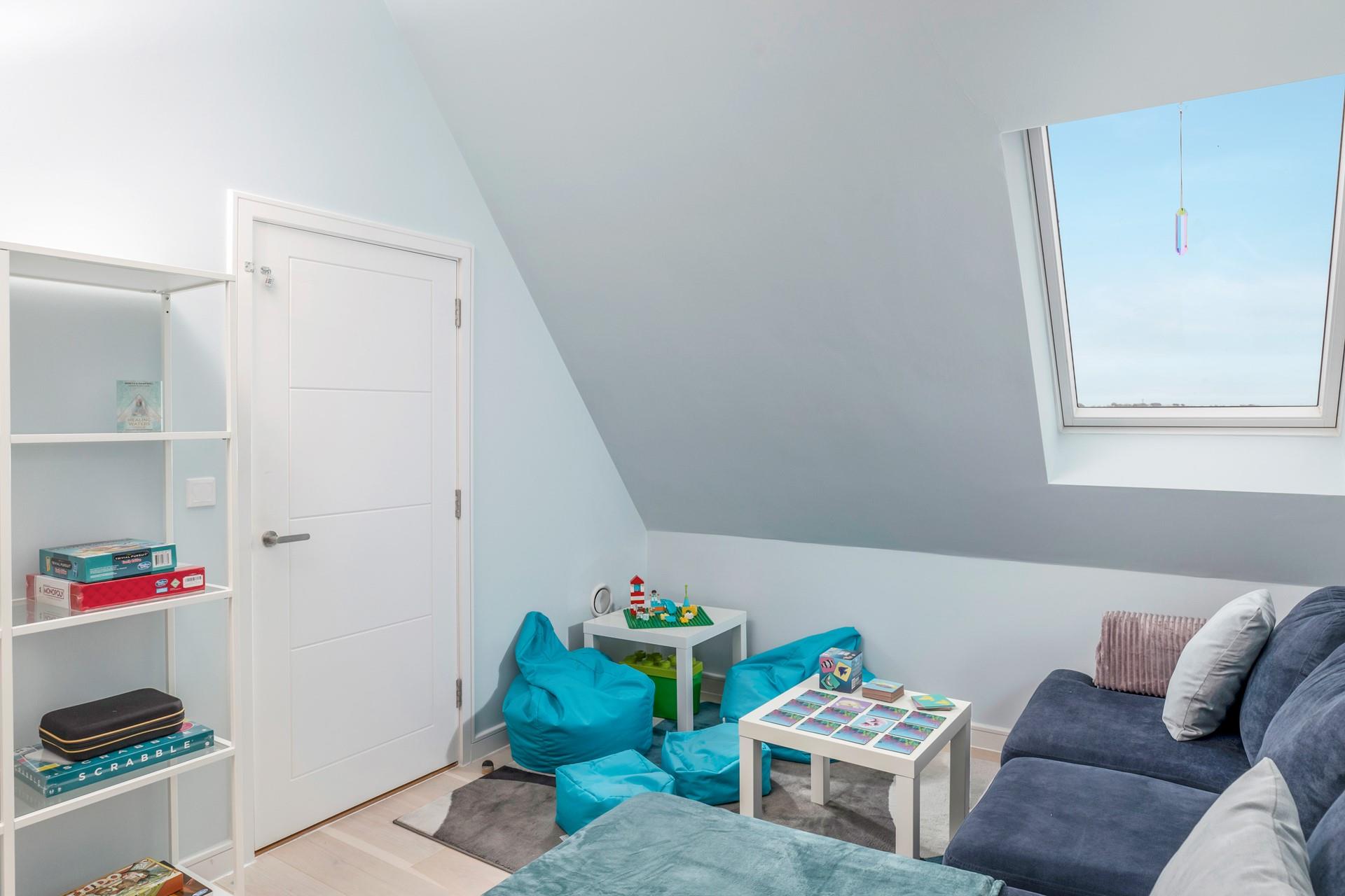 Curl up in the snug area with a good book or get the cards out or board games. 