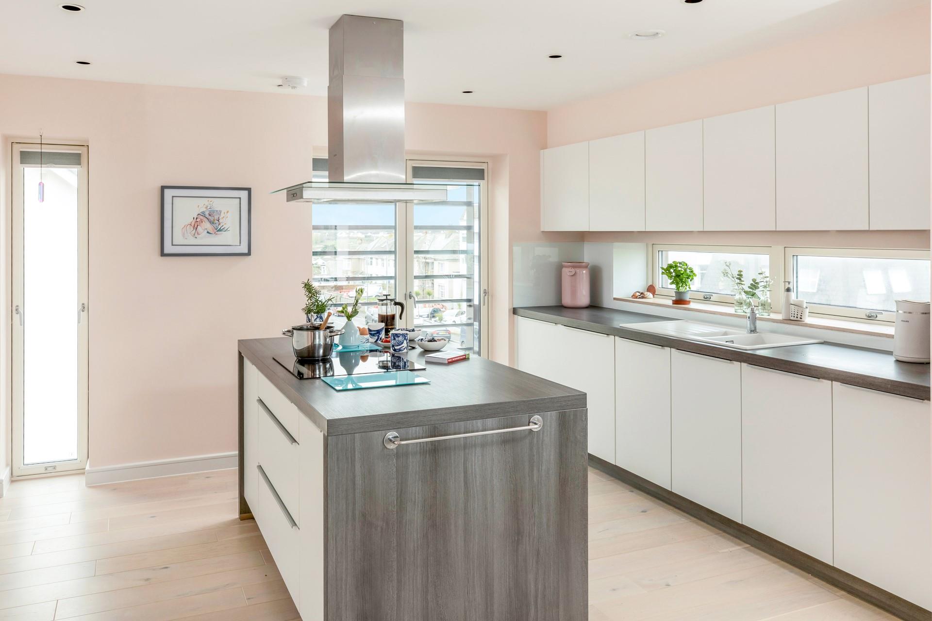 The modern kitchen has all you need to cook tasty meals.