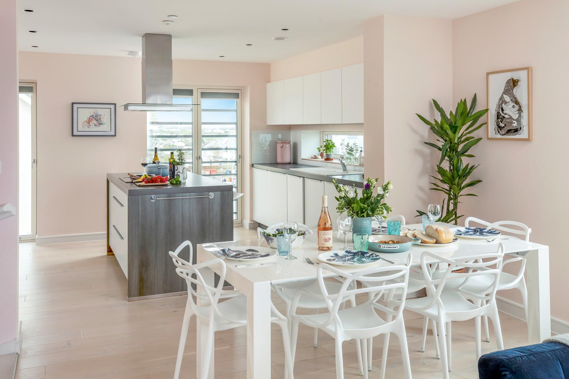 Tuck into a tasty meal around the stylish dining table.