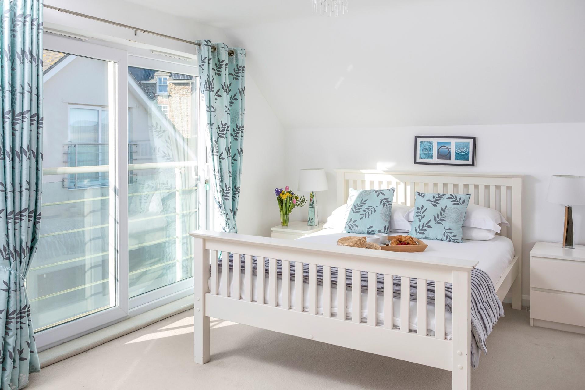 Bedroom 1 has a spacious double bed for a relaxing night's slumber.