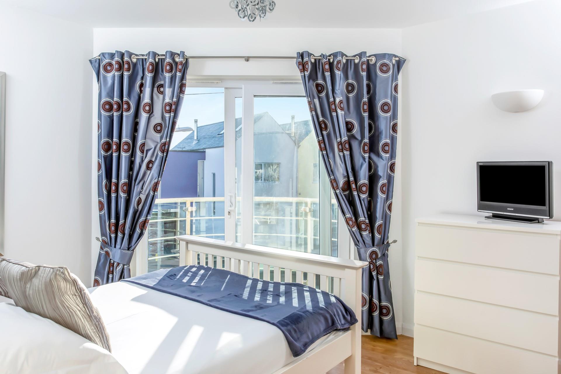 Open the patio doors and head to the balcony to check the day's weather.