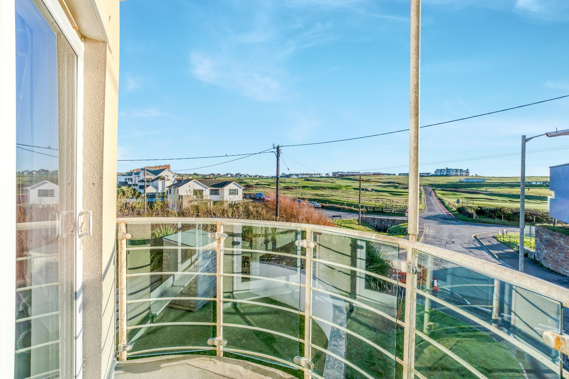 Head out to the balcony to soak up the sunshine and views.