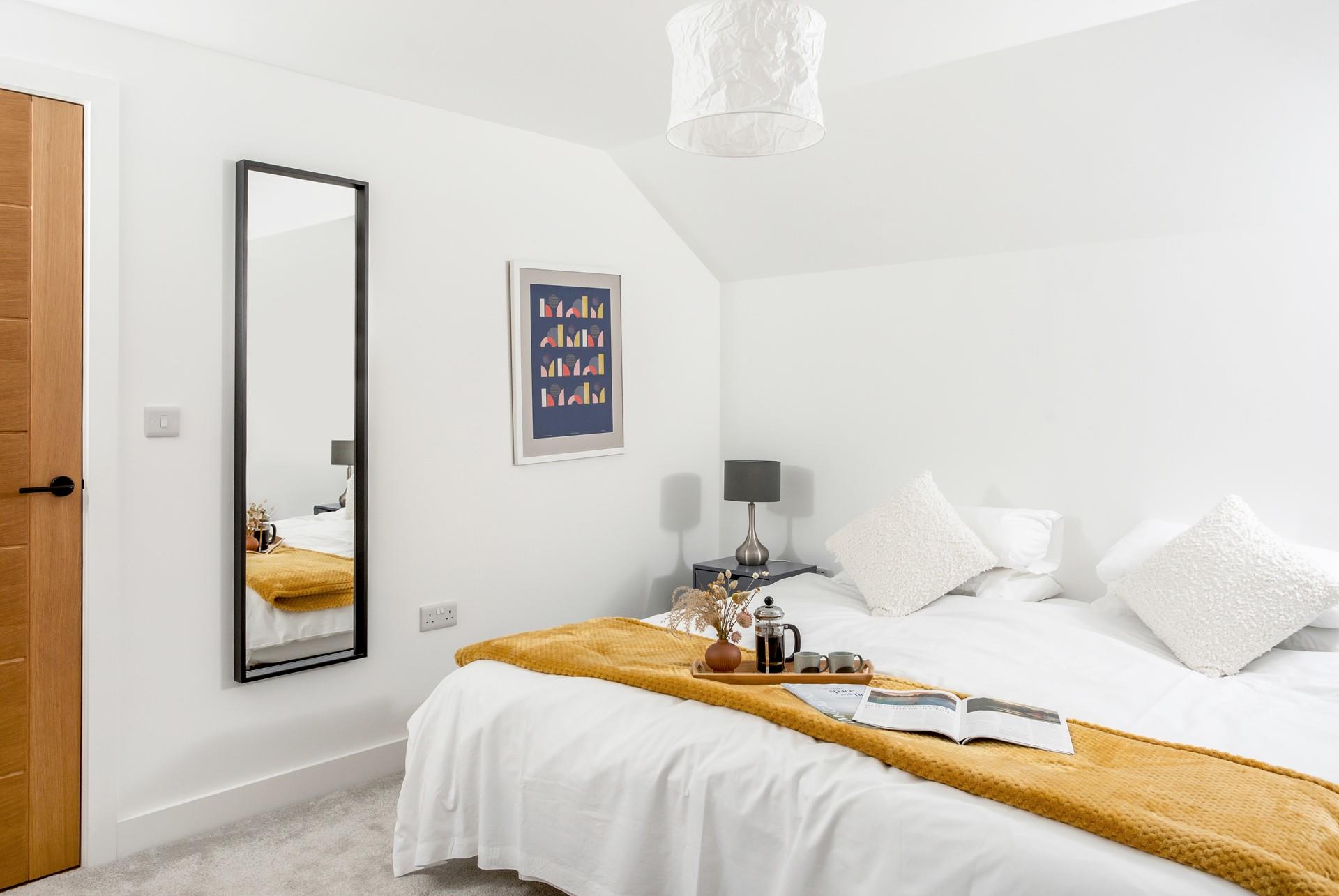 The bedrooms are decorated to create a calming space to relax.