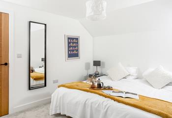 The bedrooms are decorated to create a calming space to relax.