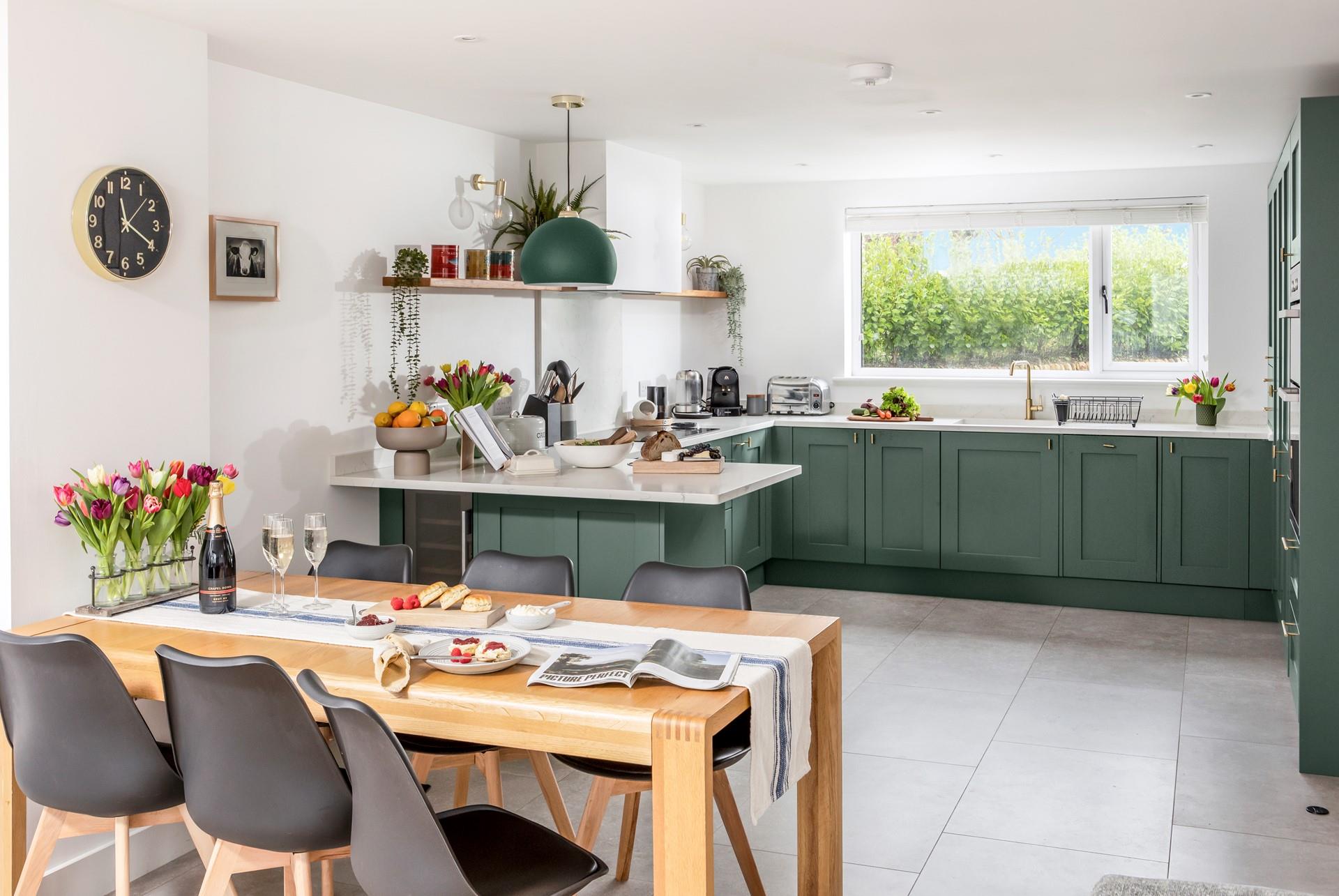The large open-plan kitchen and dining area has plenty of space for all the family.