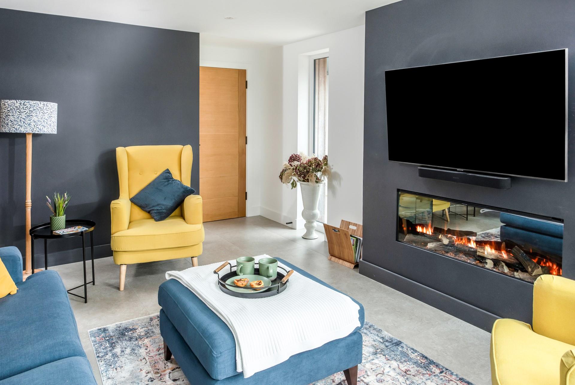 Light the fire and relax with a good movie on the TV.