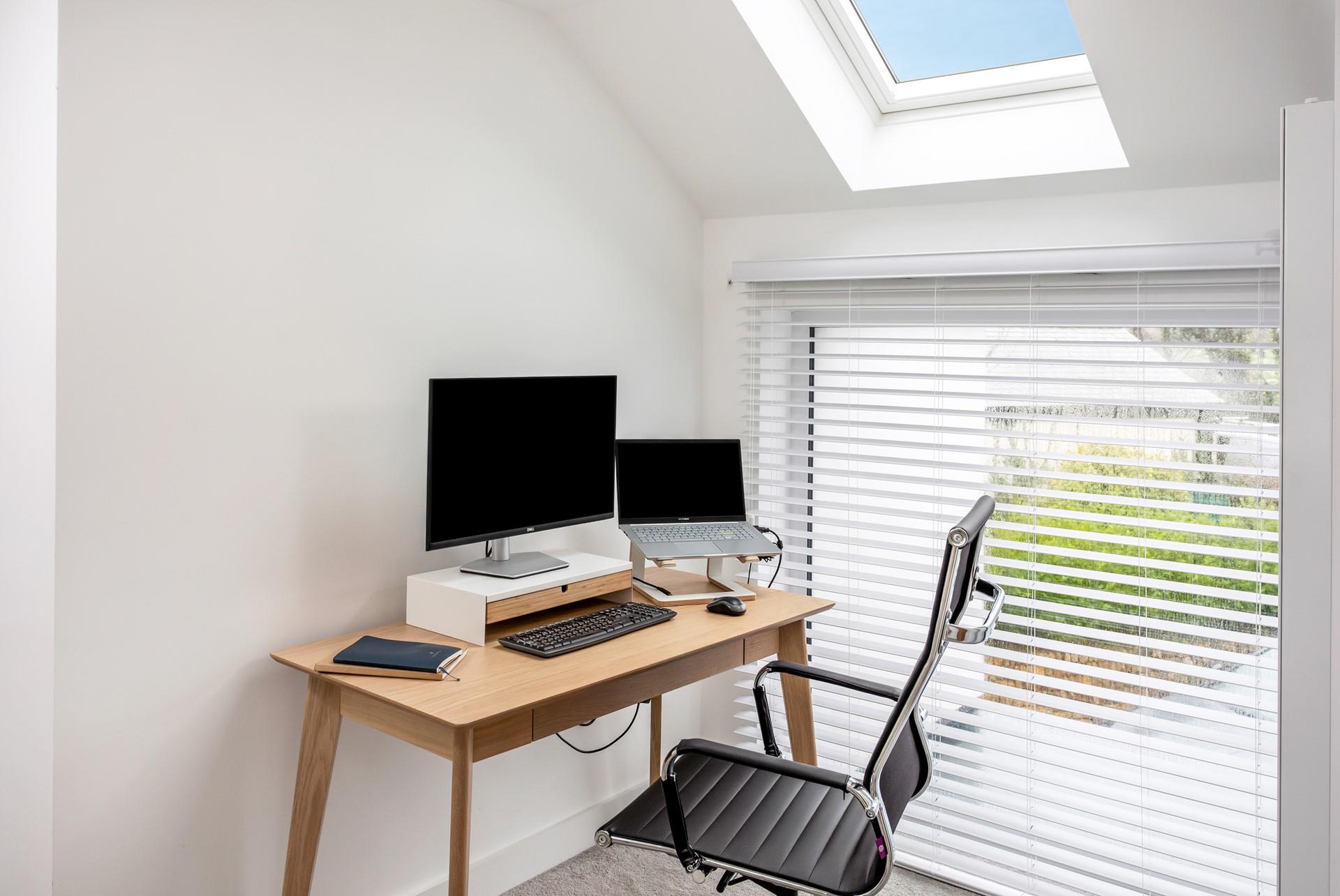 Catch up on some emails in the office area.