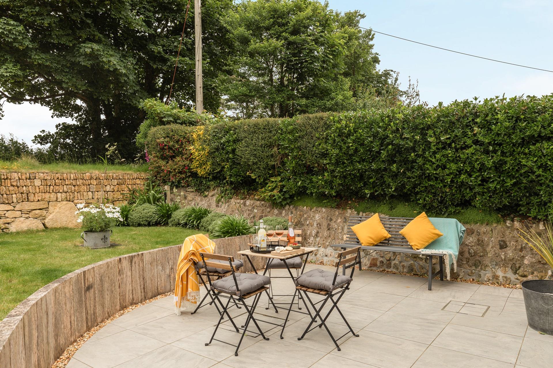 Pour a glass of your favourite wine in the garden in the evening sun.