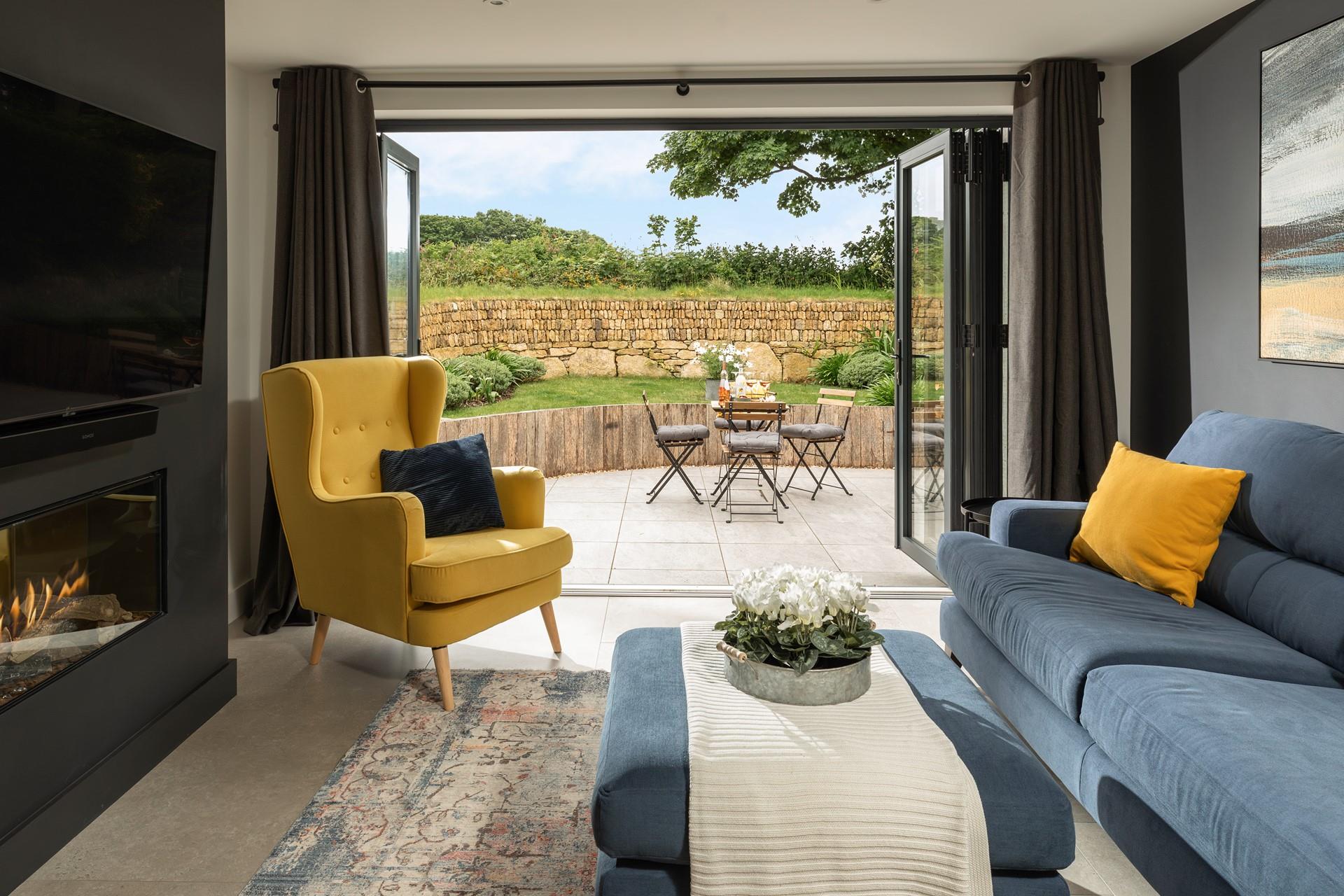 Throw open the bi-fold doors and let the fresh summer breeze in.