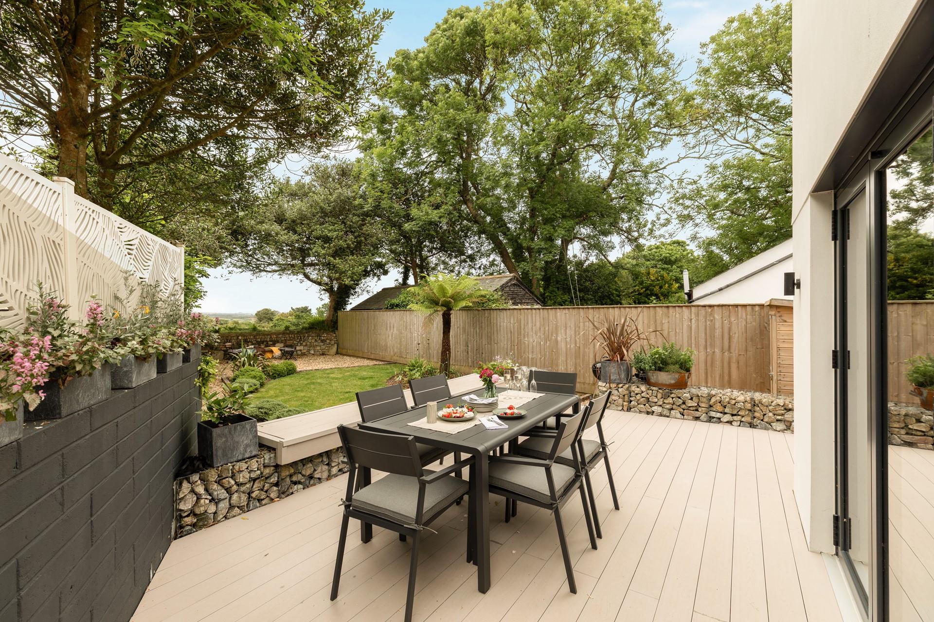 Enjoy the sounds of the surrounding countryside in the pretty garden.