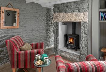 Cosy up in front of the crackling woodburner.