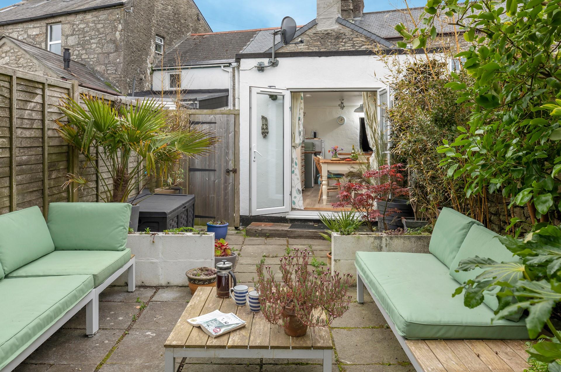 Open the patio doors and head out to the sunny garden.