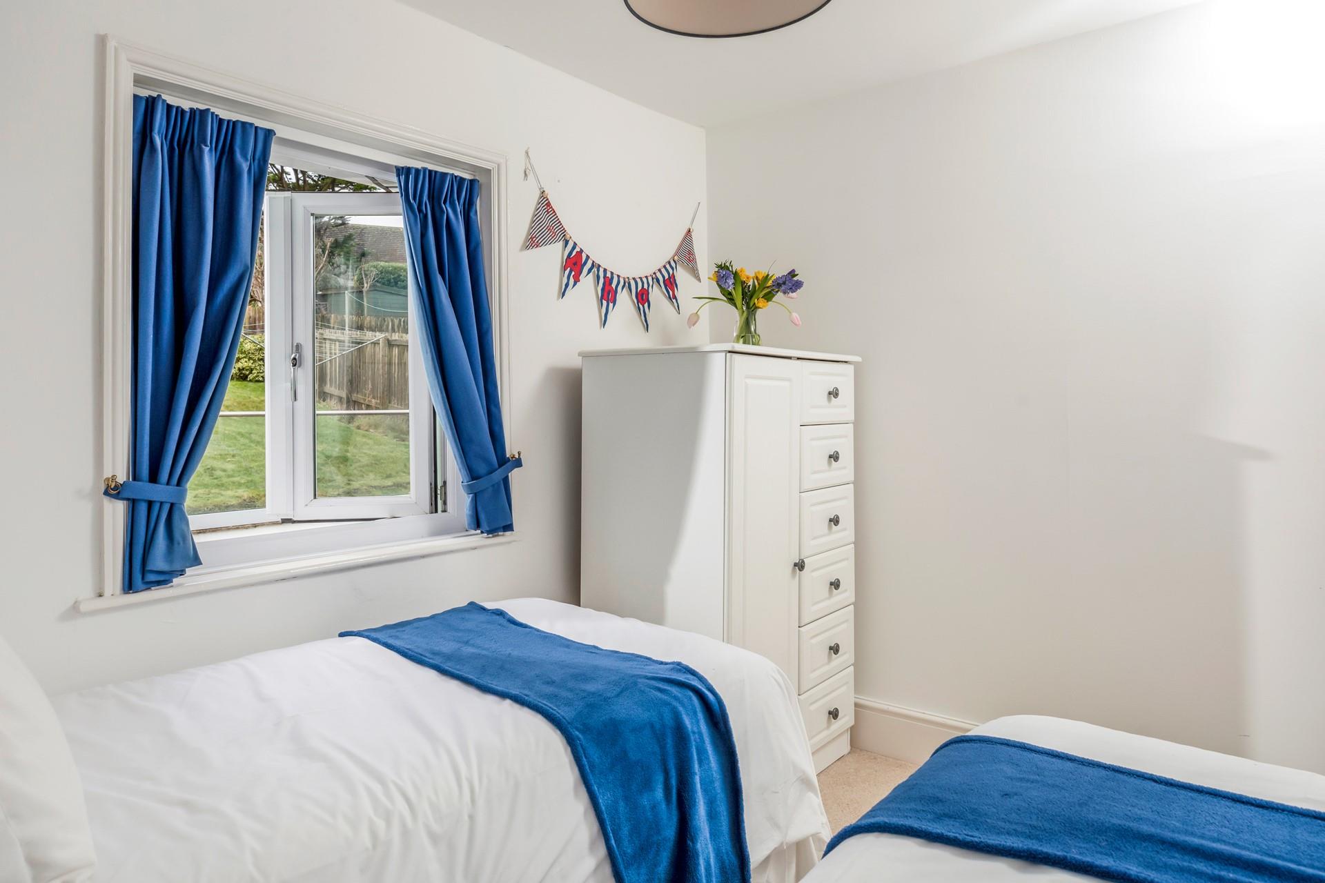 Seaside blues fill bedroom 3.