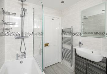 The family bathroom is the ideal space to get ready.