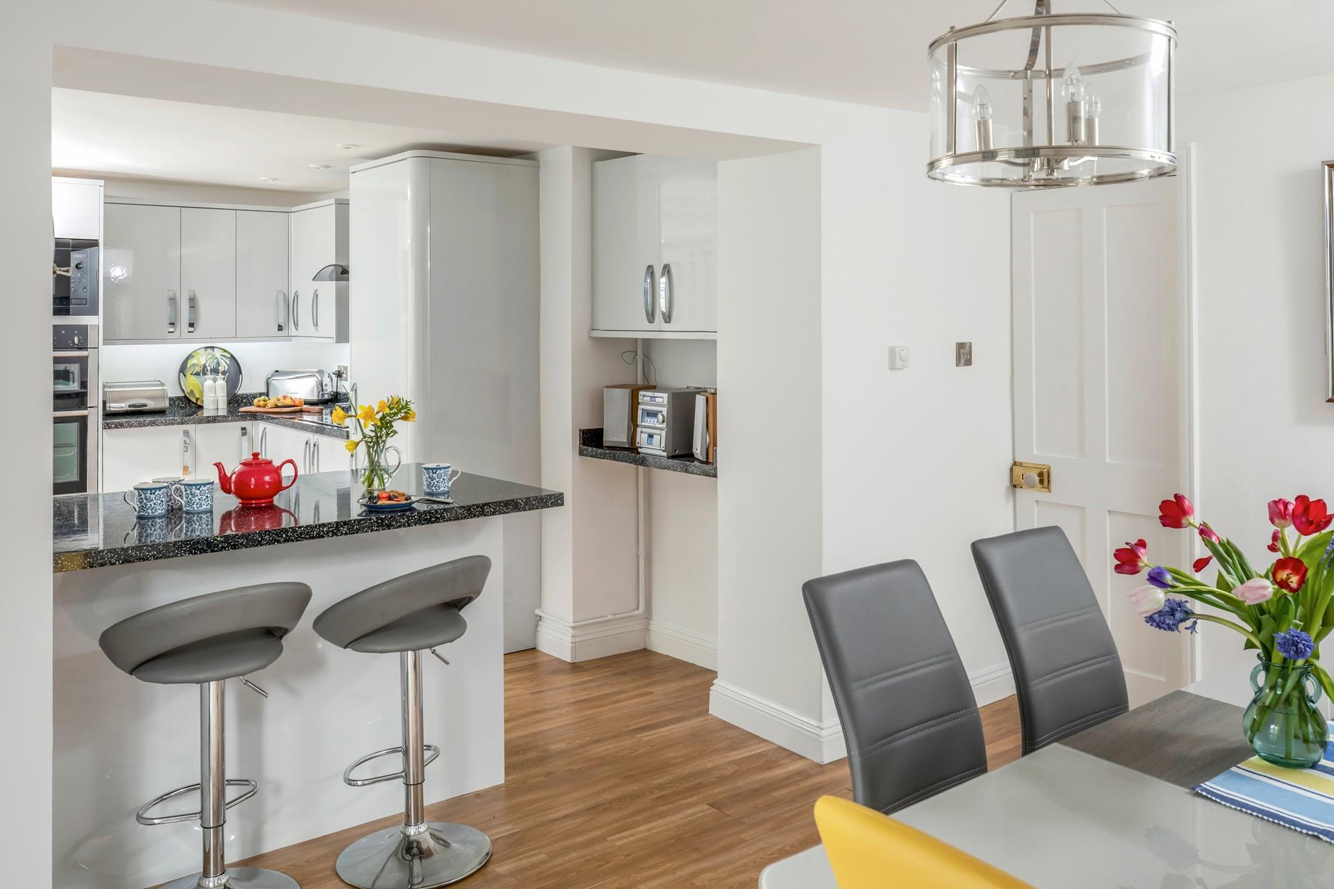 The open plan dining and kitchen area means you can cook and dine as a family.