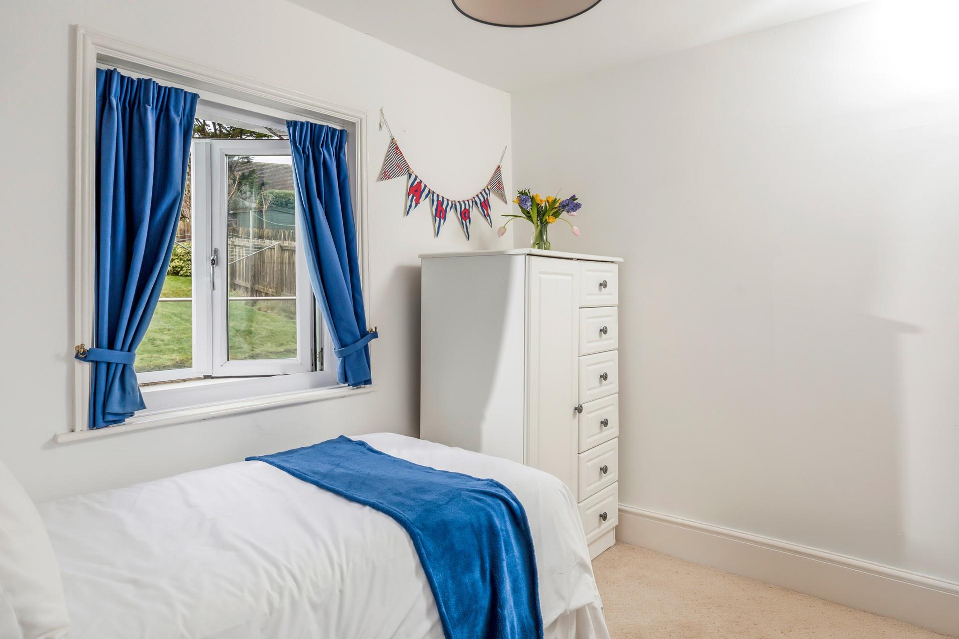 Seaside blues fill bedroom 3.