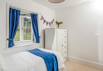 Seaside blues fill bedroom 3.