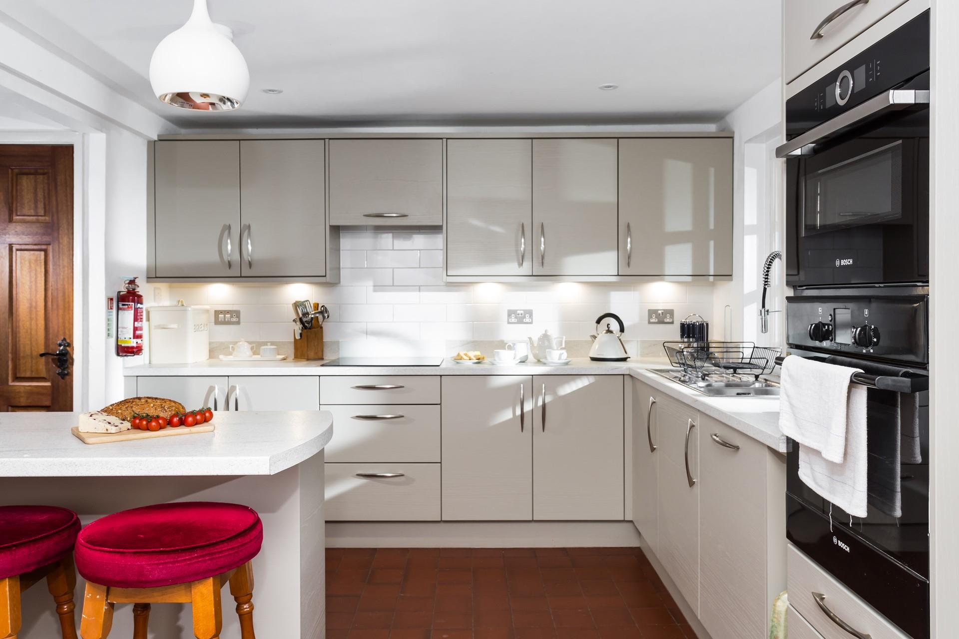 The kitchen is modern and well-equipped for cooking up a storm.