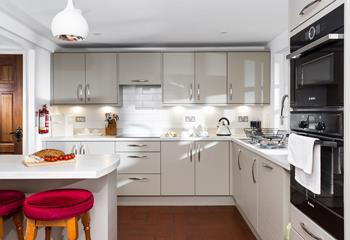 The kitchen is modern and well-equipped for cooking up a storm.